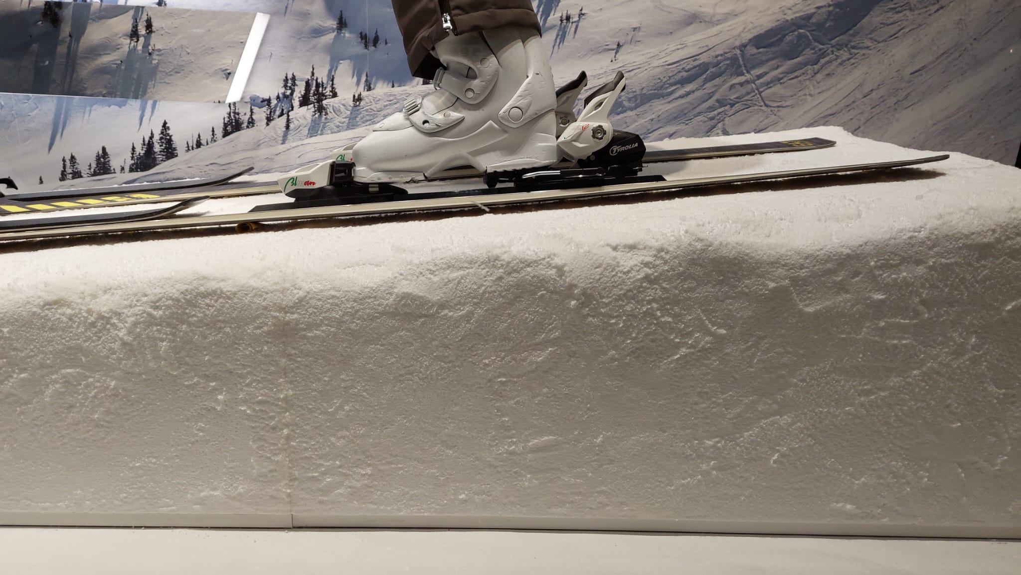 Close-up of the decorative snow-effect finish used on the EA7 Winter Games display platform