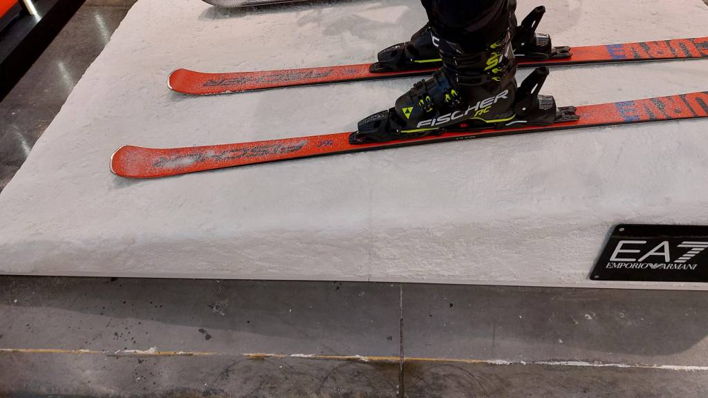 Close-up of the decorative snow-effect finish used on the EA7 Winter Games display platform