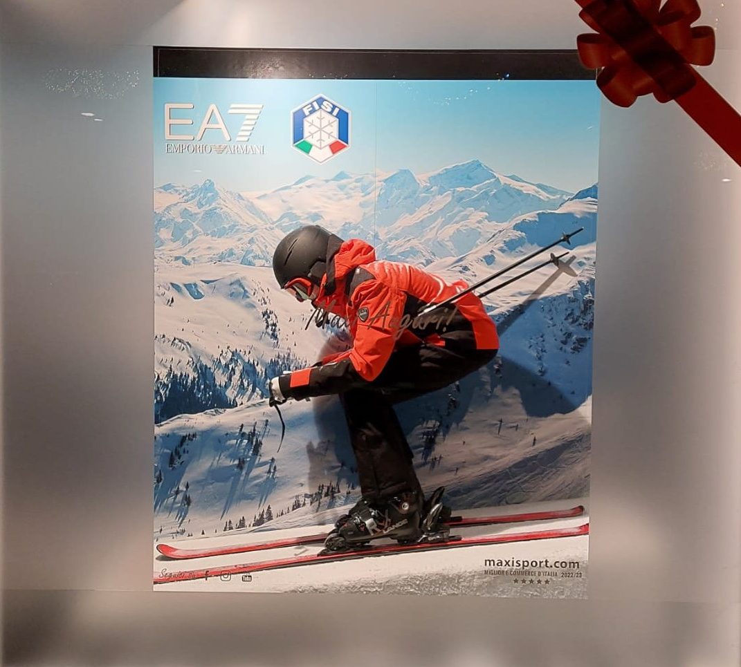 EA7 Winter Games window display viewed from outside the store